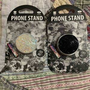 Pair of phone stands - white and black.